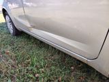 a car that is parked on the grass in the yard