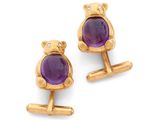 une image représentant une paire de boutons de manchette en or et en améthoreate en forme d'ours