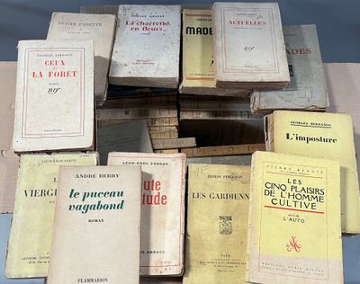 a lot of old books on a table together