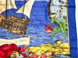 a blue scarf with a picture of a pirate on it