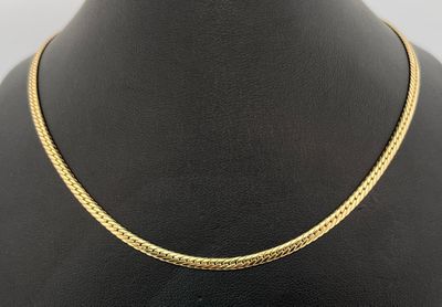 Collier en or jaune 750 millièmes à maille tressée. Poinçon tête d'aig - Photo 1