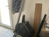 a chair that is next to a door in a room