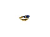 a close up of a gold ring with a blue stone on it