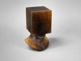 an image of a sculpture of a man ' s head with a box on top of it