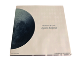 a book with a picture of the moon on it