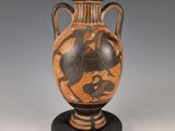 un vase orné d'un cheval et d'un oiseau