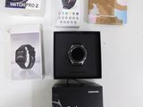 a box with a watch sitting on top of it