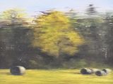 a painting of hay bales in a field with trees in the background