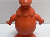 a small toy animal that is standing on its hind legs