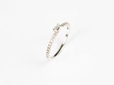 a white gold and diamond ring on a white background