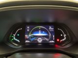 the dashboard of a car with a digital display on it