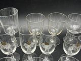 a lot of empty wine glasses on the table