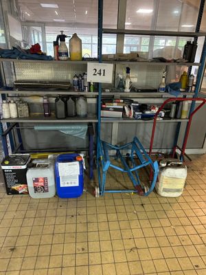 a picture of a kitchen with a lot of stuff on the floor
