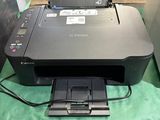 a printer that is sitting on top of a table