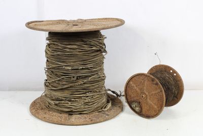 an image of a spool of rope and a spool of wood