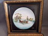 an old picture of a man and woman in a boat on a lake