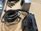 a box that has some wires on it on a table
