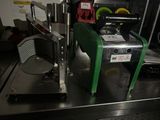 a machine that is sitting on a table in a kitchen