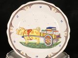 a plate with a horse drawn carriage on it