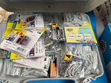 a lot of screws and screws in a box