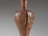 an image of a wooden sculpture of a woman ' s head