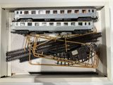 a box with a bunch of train tracks in it