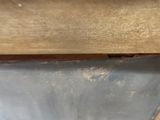 a close up of a piece of wood on a table