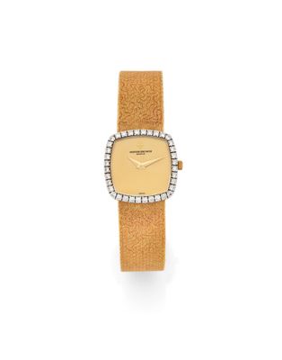an 18 carat gold and diamond set wristwatch, by cartier