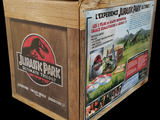 a cardboard box with a picture of a jurassic park logo on it