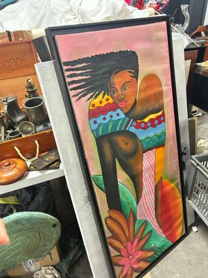 un tableau représentant une femme tenant une planche de surf à côté d'un tas d'autres objets