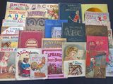 many children ' s books that are on the table