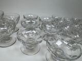 a lot of empty glass bowls on a table