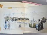 un livre ouvert sur lequel figure le dessin d'une femme en robe bleue et d'une femme en robe bleue