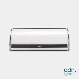 a white air conditioner sitting on top of a white wall