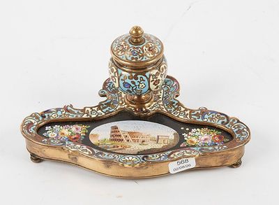 a gold and blue tray with a picture on it