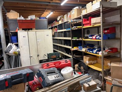 a room filled with lots of boxes and other items