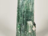 a close up of a piece of green mineral