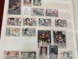 un livre avec beaucoup de timbres