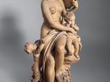an image of a statue of a woman holding a child