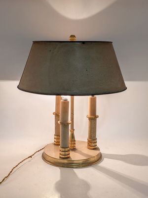 a lamp that is sitting on a table with a lamp on it