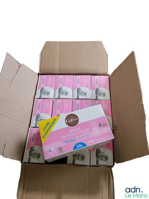a cardboard box with a lot of baby bottles inside of it