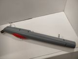a gray and red object in a white box