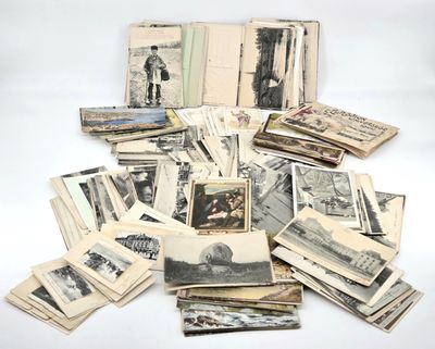 several old black and white photographs of men and women on a table