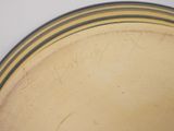a close up of a plate with writing on it
