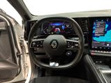 a picture of the interior of a car with a touch screen