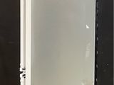 a white door that is open on the ground