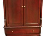 a wooden armoire with two drawers and two doors