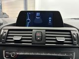 a picture of a car dashboard with a tablet on it