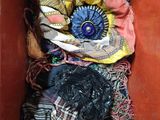 a box full of clothes and other items in it