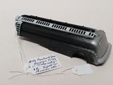 a small black object with a tag on the side of it